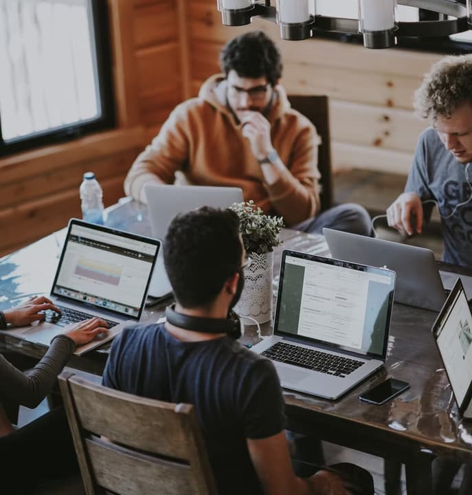 Design team collaborating on creative project in studio